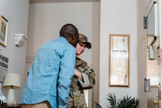 A touching moment as a soldier is warmly embraced by their partner at home.